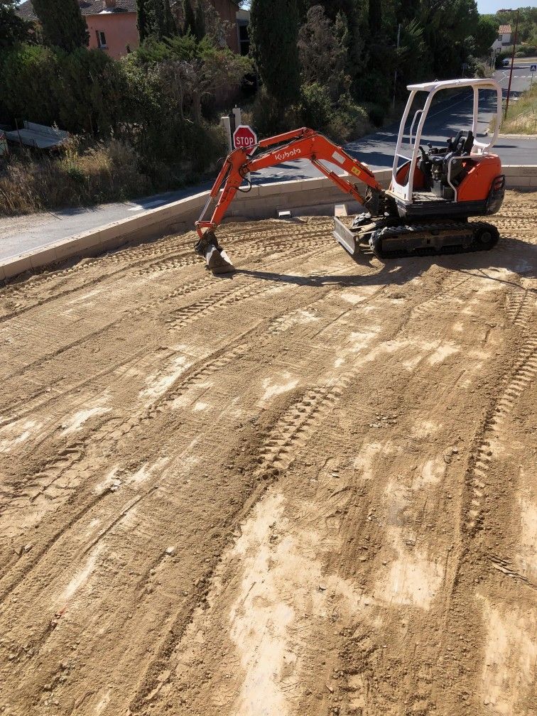 Combien coûte un terrassier ? Guide complet 2026